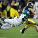 Michigan wide receiver Drew Dileo makes a big catch around Michigan State safety Isaiah Lewis during the fourth quarter against Michigan State at Michigan Stadium on Saturday afternoon. Melanie Maxwell I AnnArbor.com